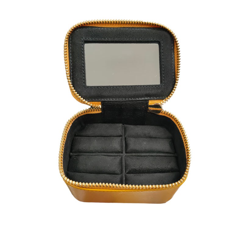 Etui bijoux cuir orange detail coussins