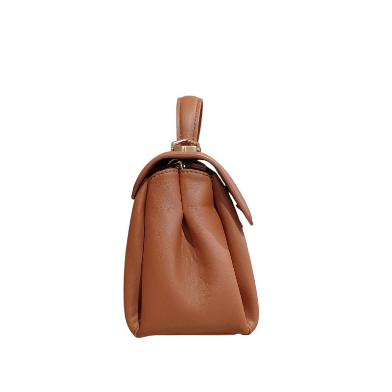 Pourchet sévigné mm 25096 porté main camel coté